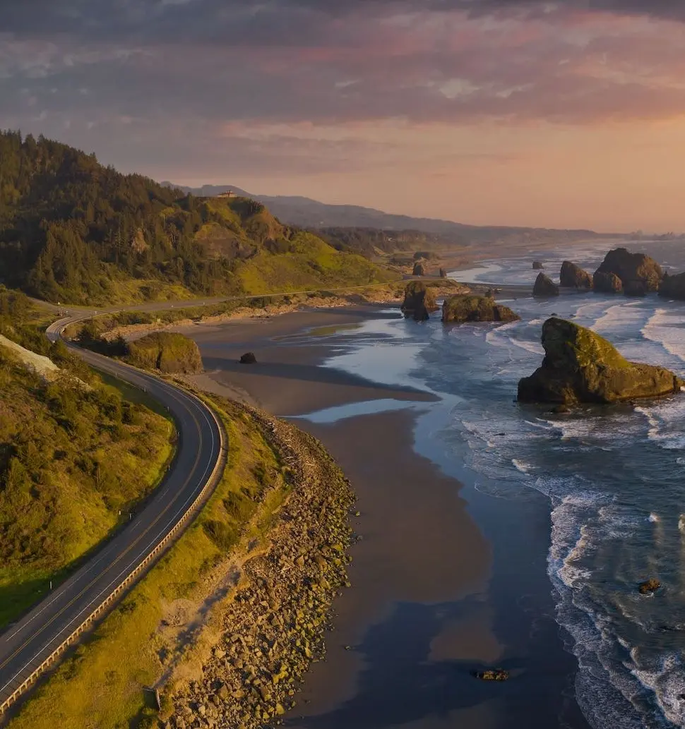 Aerial view of Three Capes Loop along the coast line near Inn at Cape Kiwanda