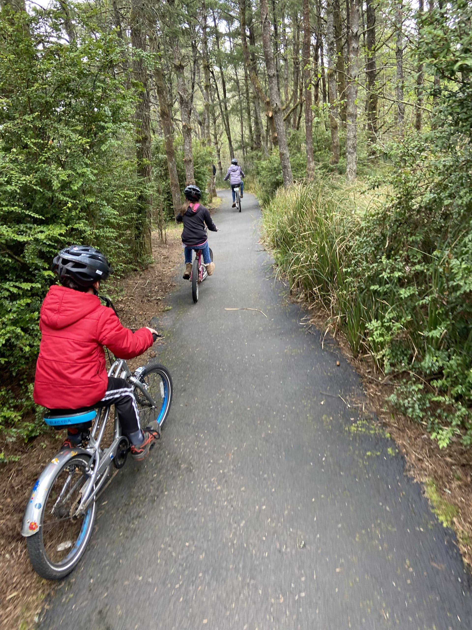 A family bike ride through the trails of Inn at Cape Kiwanda