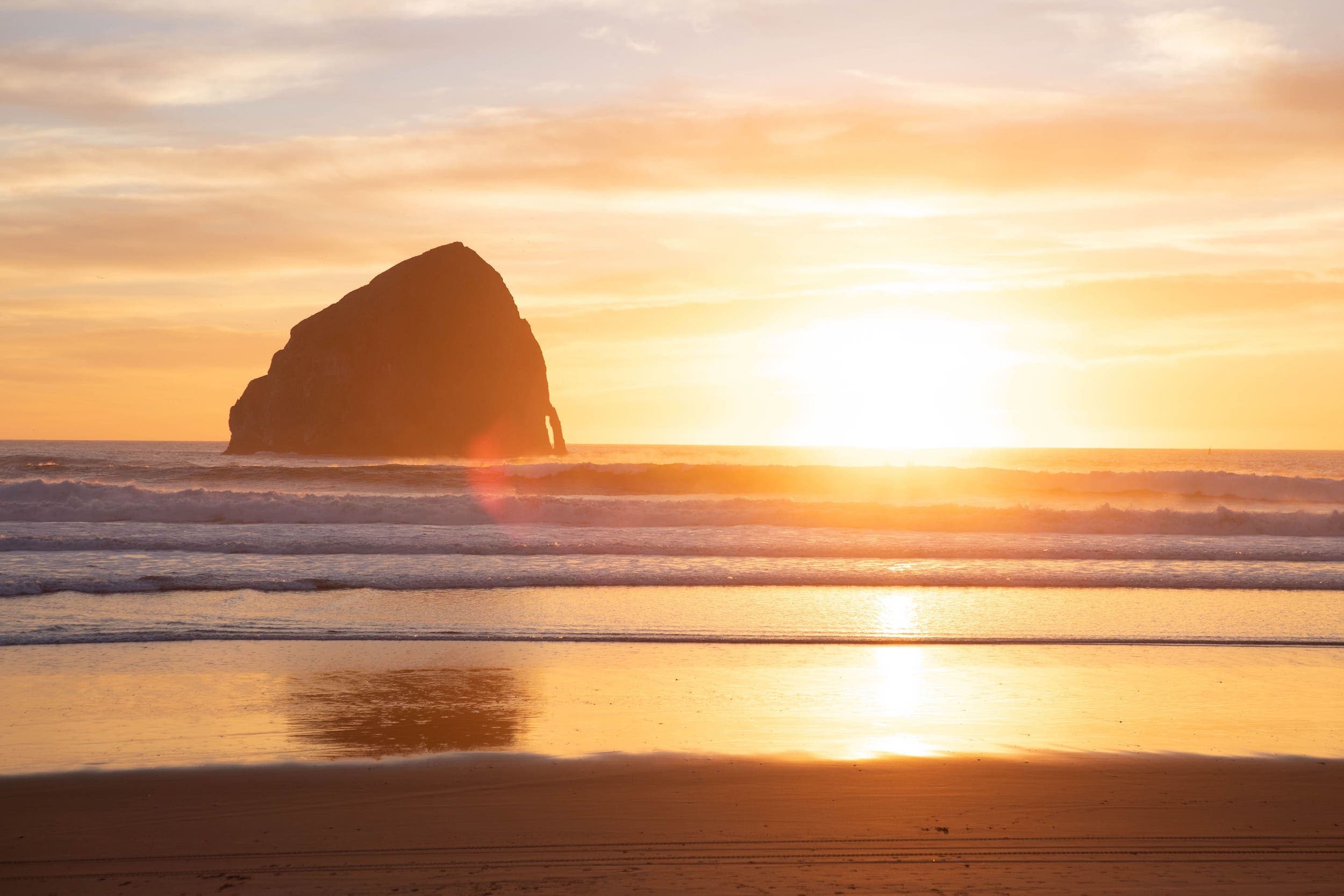 The beach at sunset near Inn at Cape Kiwanda