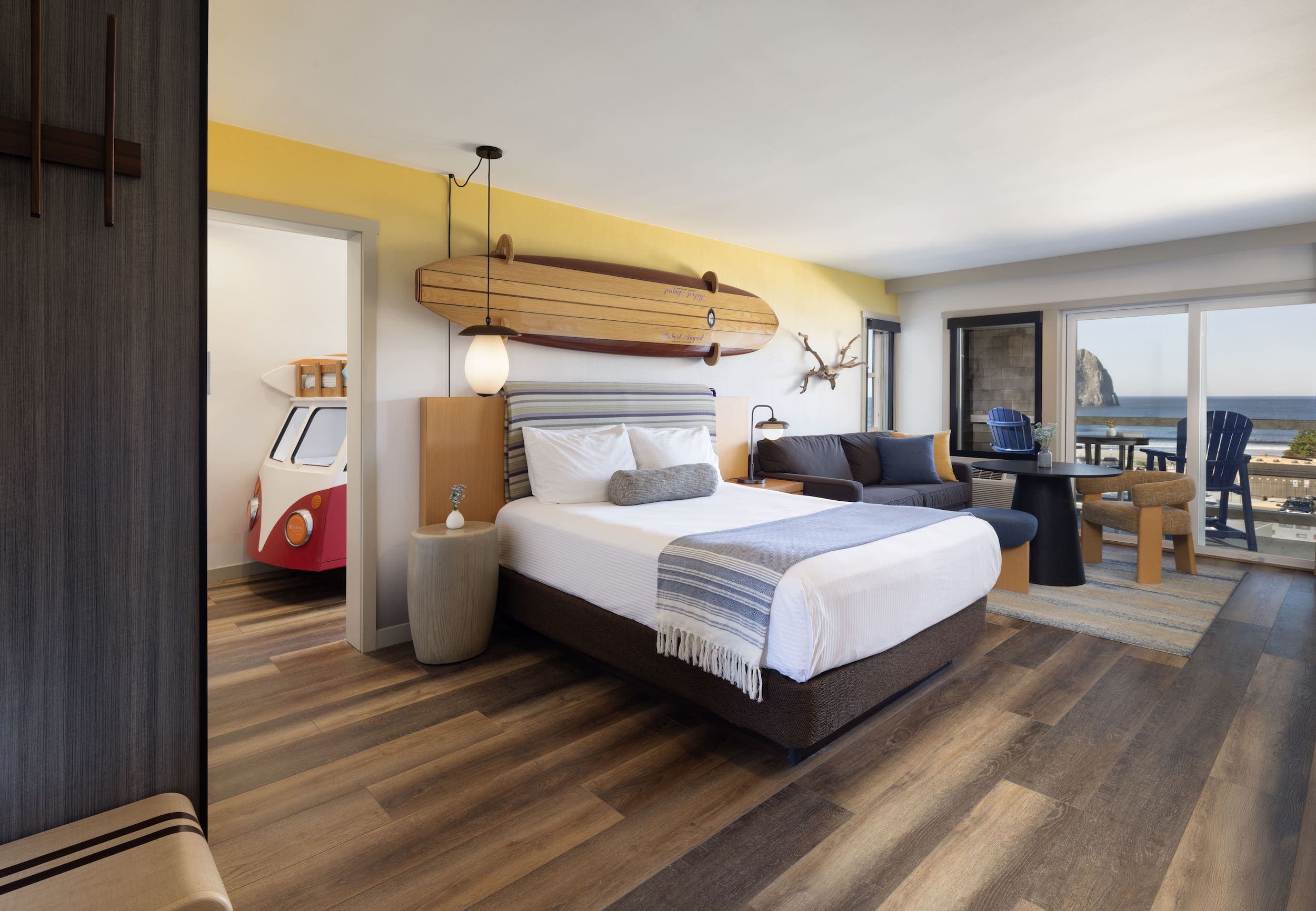 Inn At Cape Kiwanda ONeill Suite With Bunk Room with a separate kids room and the rest of the room is open concept with the living space and bed area open to eachother