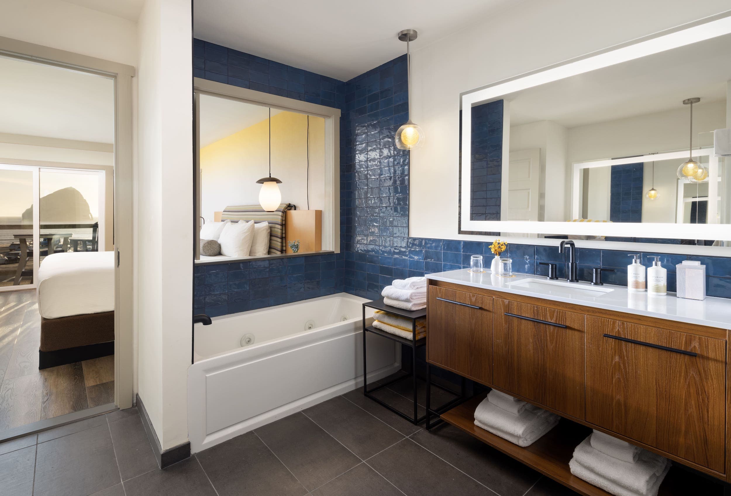 Inn At Cape Kiwanda Signature King Jetted Tub Partial View Bathroom with a large vanity and mirror