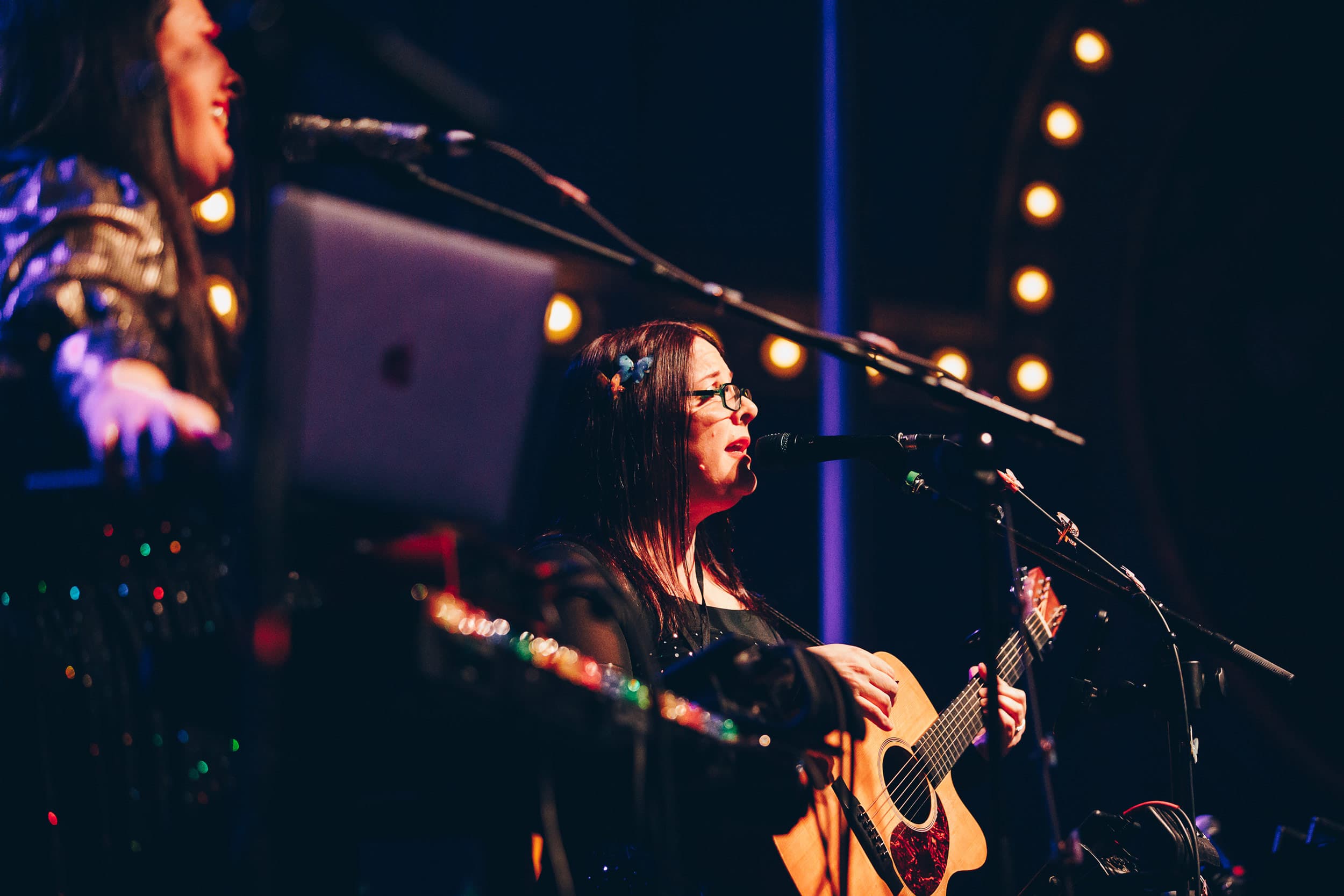 Lady Playing Guitar At Meridian