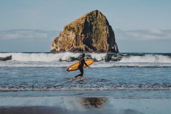 Surfer at Cape Kiwanda